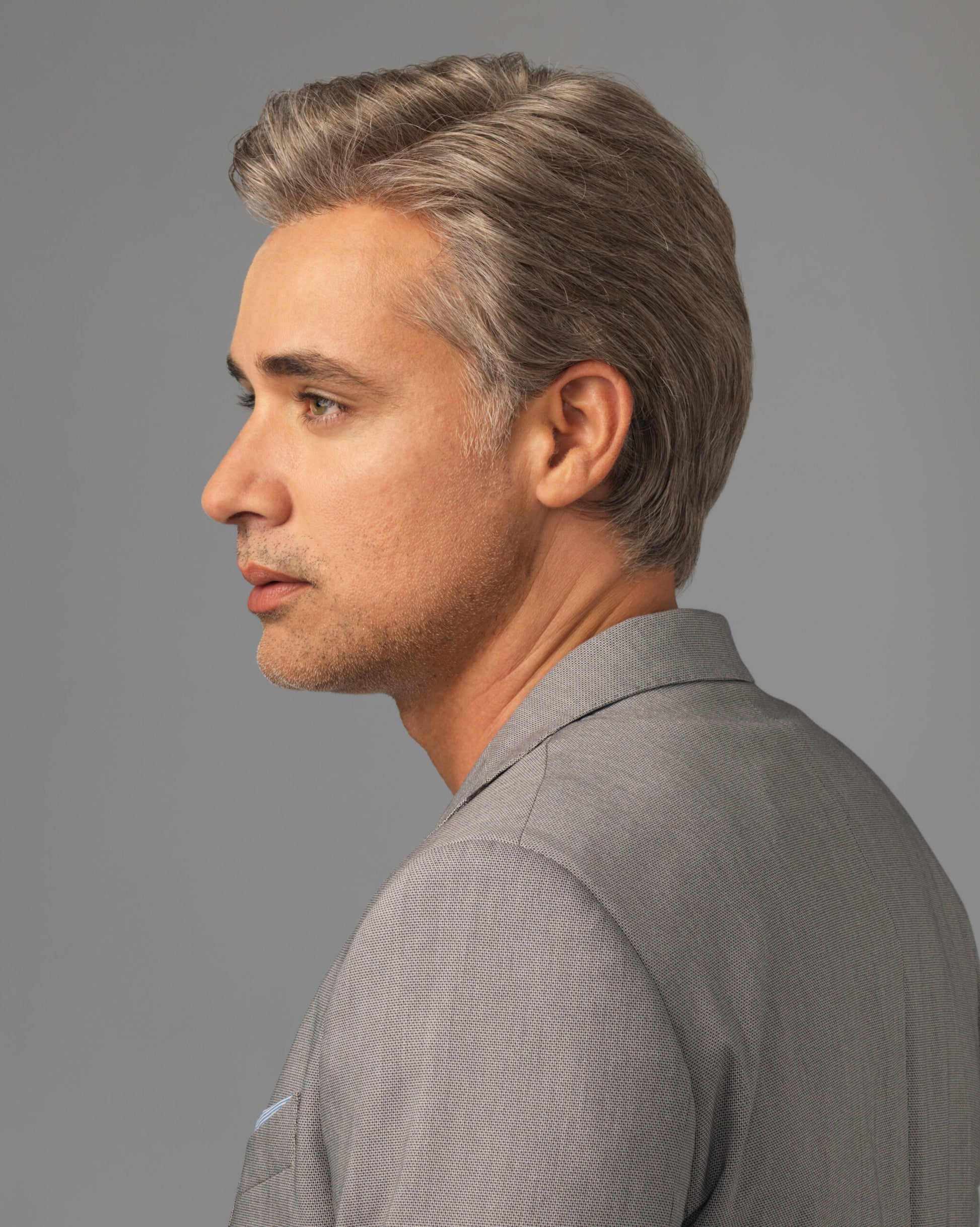 HairUWear realistic men's wigs for thinning hair salt and pepper side profile man in gray suit natural look