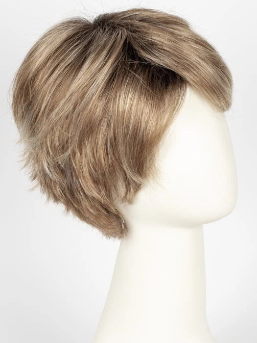 short silver wig for women styled in layered pixie cut with side swept bangs on mannequin for everyday wear