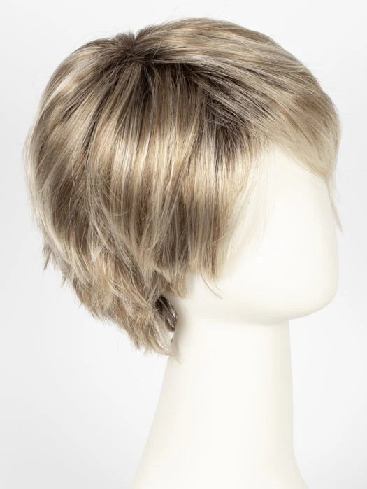 short silver wig for women layered pixie cut with side swept bangs and subtle dark roots on white mannequin head