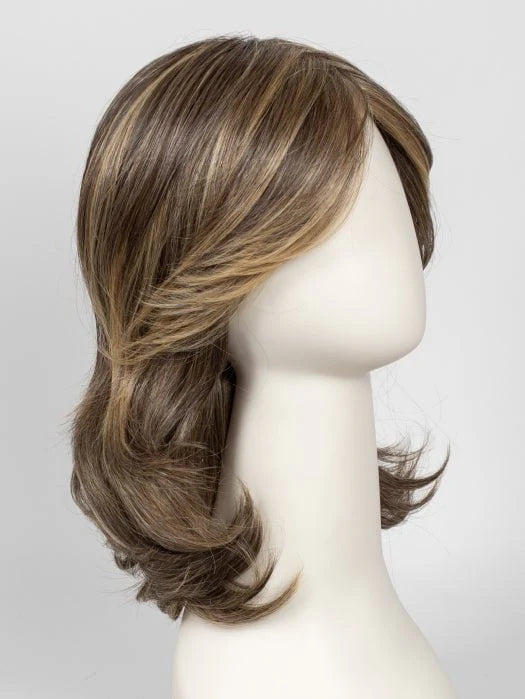 Raquel Welch Goddess wig shoulder length warm brown with blonde highlights and soft layered waves on mannequin