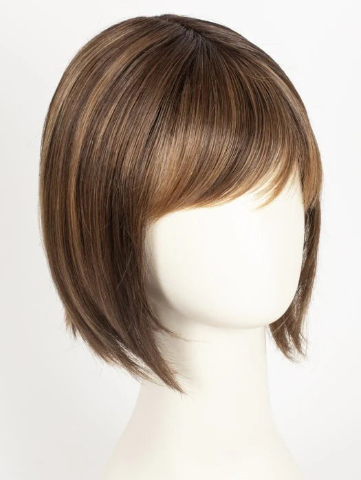 Short layered bob on mannequin with side bangs in warm highlighted tones blonde synthetic wig Ellen Wille
