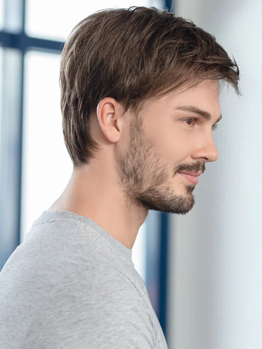 Ellen Wille George men's wig in natural brown on side profile model with short layered hair and light stubble
