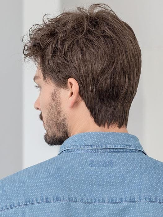 Back view of Justin Ellen Wille men's wig medium brown short layered tousled style on male model