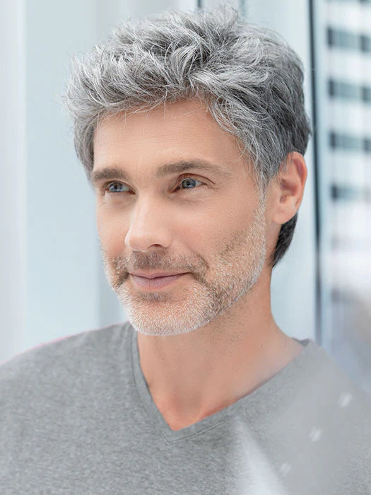 Gray textured short style Justin Ellen Wille men's wig on mature model with natural tousled look and stubble