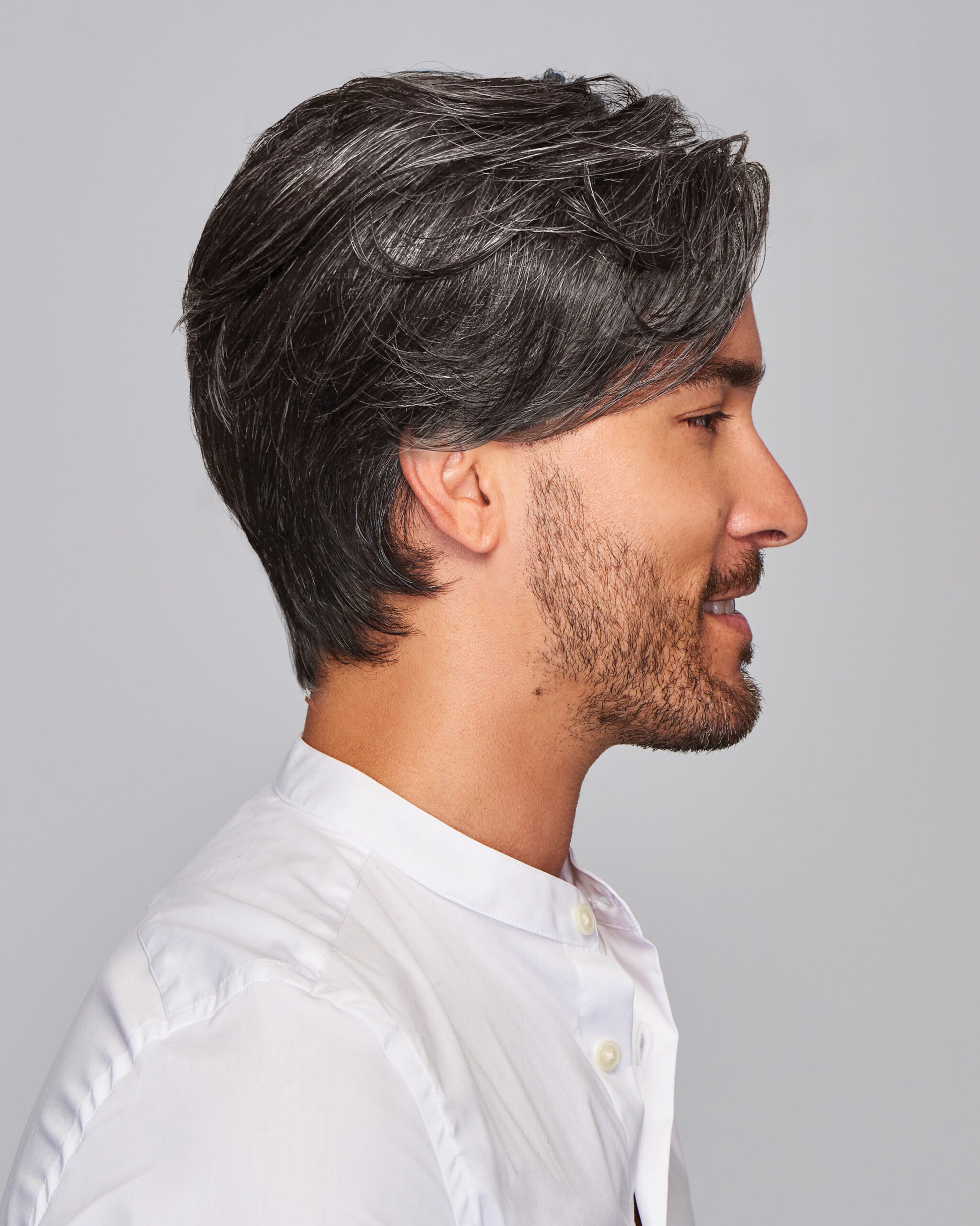 Gallant HIM wig for men by HairUWear on male model in gray layered medium length natural style