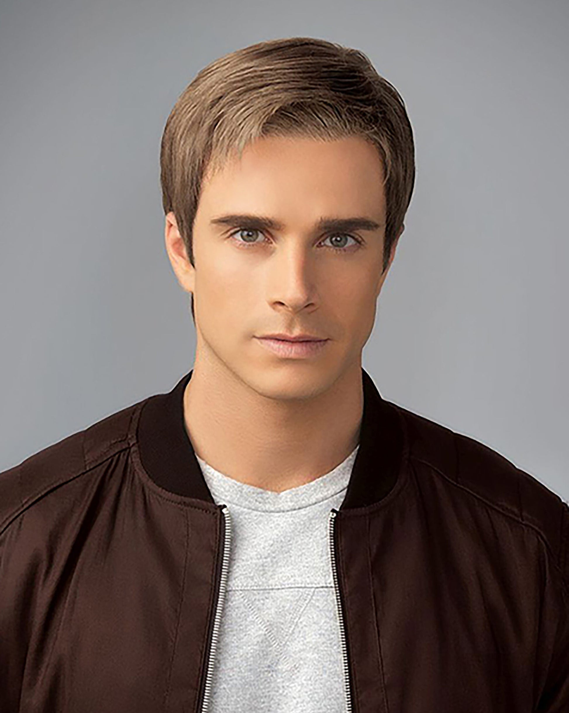 HairUWear men's natural look wig in light brown on model with short layered style and realistic hairline