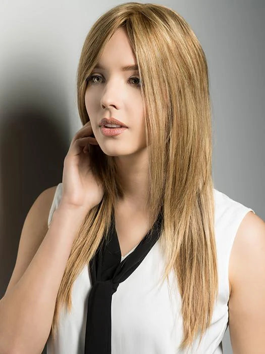 Stylish human hair wiglet for thinning hair, featuring long blonde strands and a natural look