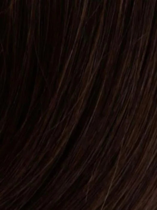 Close-up of soft, shiny strands of a human hair wiglet for thinning hair in dark shades