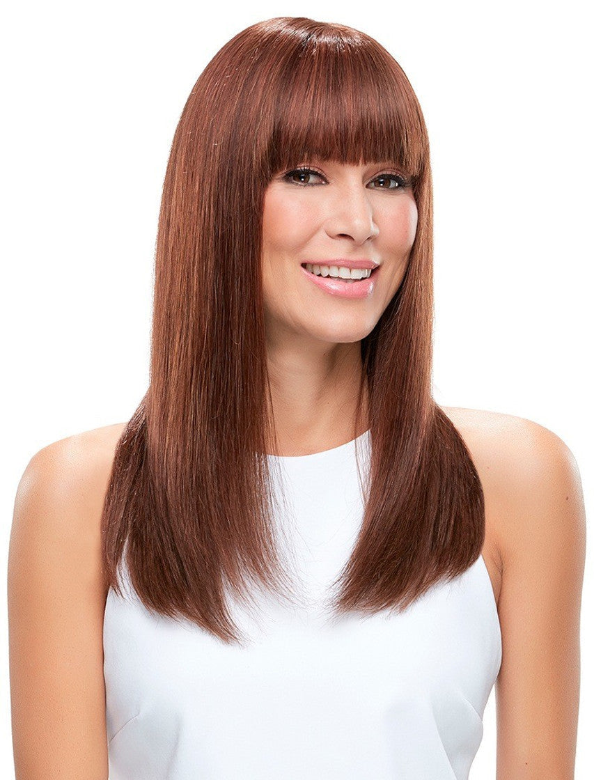 Jon Renau Lea wig featuring long, straight hair with bangs in a rich auburn color