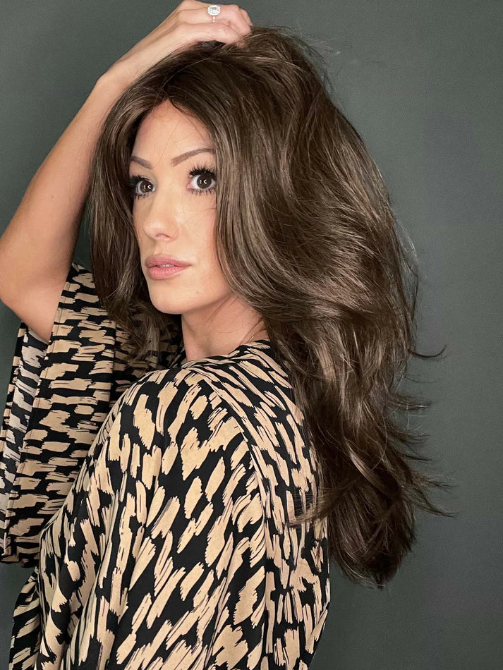 Brandi Amore wig long layered brown hair with side part and natural volume on model