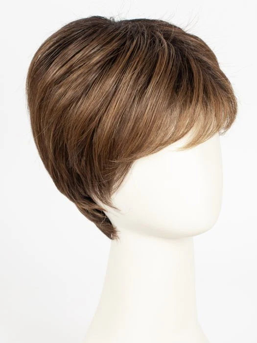 short blonde synthetic wig with layered pixie cut and side swept bangs on white mannequin