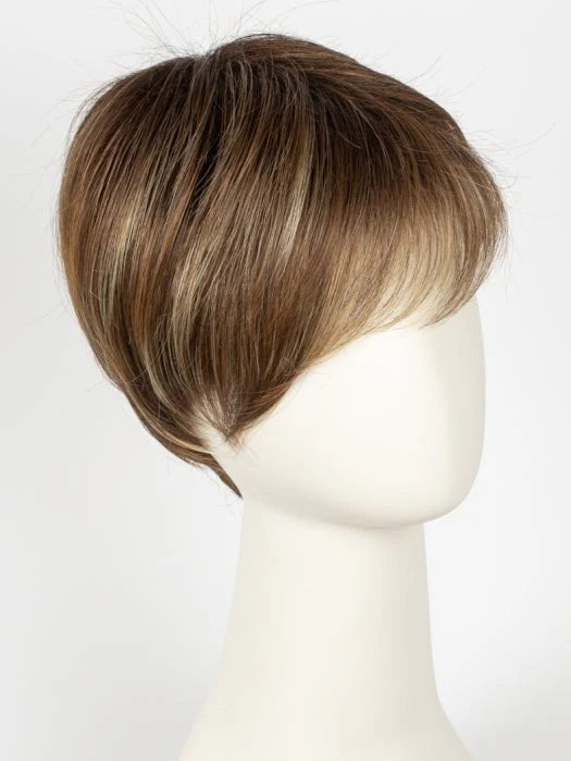 Short layered pixie style short blonde synthetic wig with natural highlights and side swept bangs on mannequin head