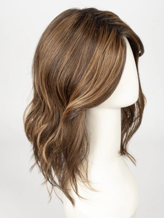 Medium length synthetic wig with soft waves and highlights in warm brown shades