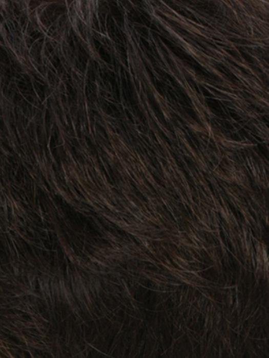 Natural look of a monofilament hair topper for thinning hair in dark brown shades