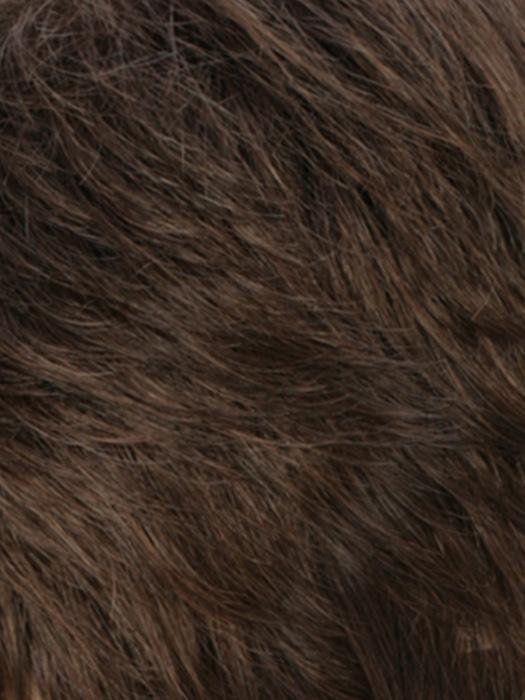 Close-up of a natural-looking monofilament hair topper for thinning hair in rich brown color