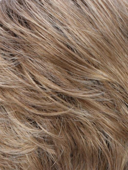 Close-up of a monofilament hair topper for thinning hair in light brown shades for natural appearance