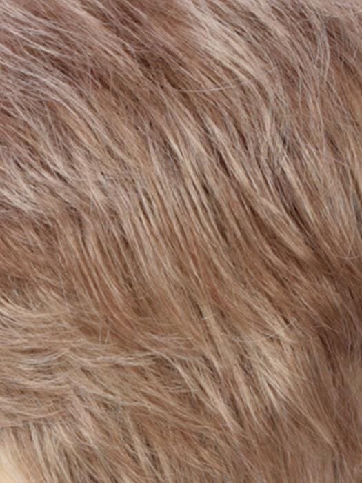 Natural-looking monofilament hair topper for thinning hair in a warm light brown shade
