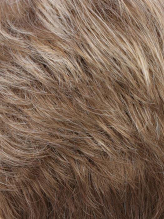 Natural-looking monofilament hair topper for thinning hair in light brown color with soft texture