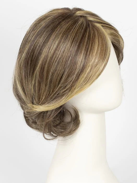 Raquel Welch Crowd Pleaser wig by First Lady Products honey blonde layered low bun with side swept bangs
