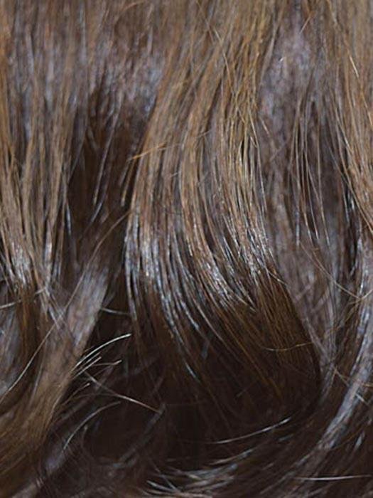 Close-up of rich brown strands of Wig Pro lace front wig showcasing natural waves and shine