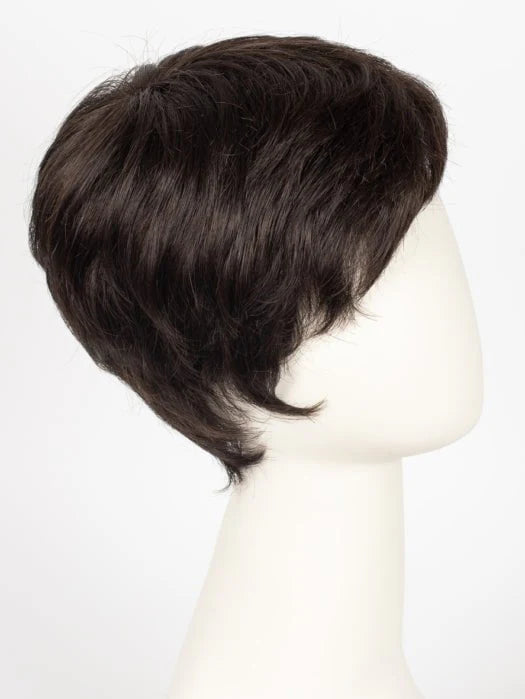 Short dark brown layered pixie wig on white mannequin side profile Ellen Wille Risk wig natural textured style