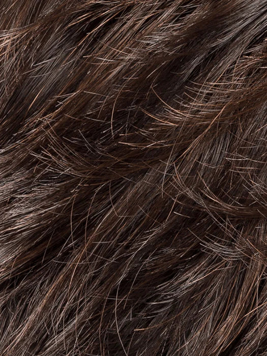 Close-up of a short pixie cut wig for women featuring soft, textured strands in a rich brown shade